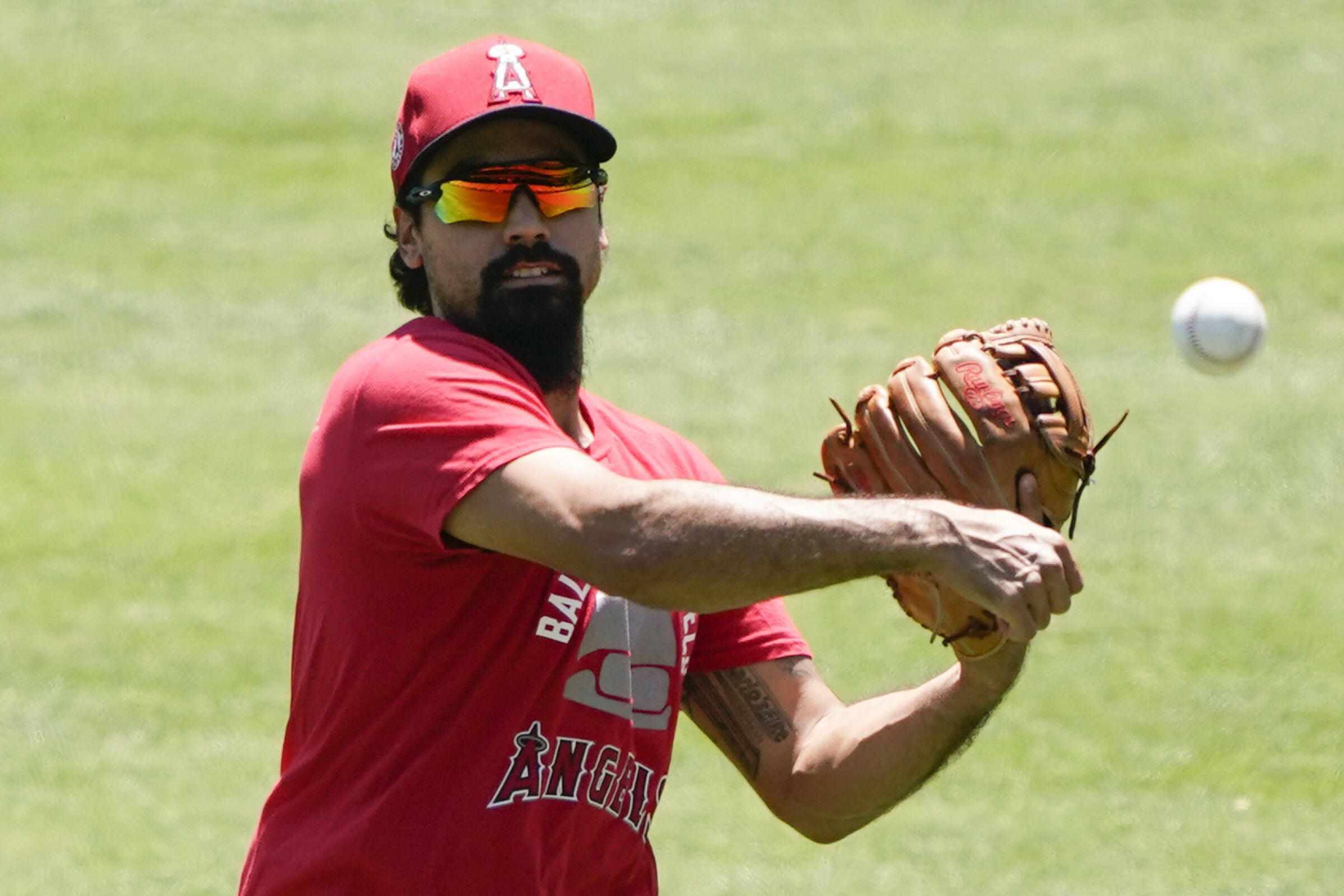 Los Angeles Angels third baseman Anthony Rendon throws during practice.