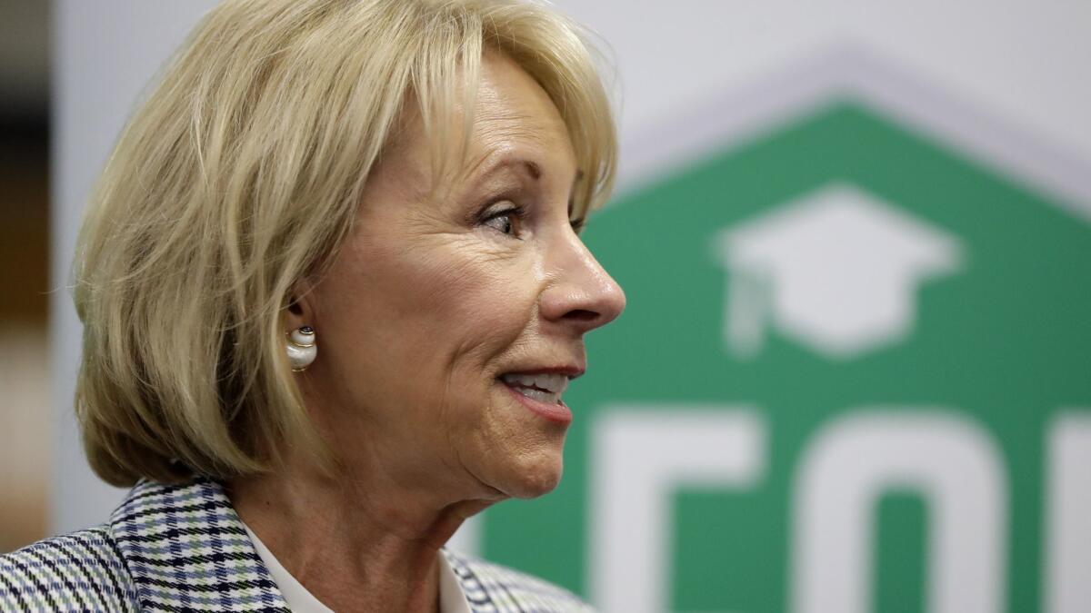 The Education Department, led by Betsy DeVos, created eligibility criteria that are far more rigid than Congress envisioned, Senate Democrats say.