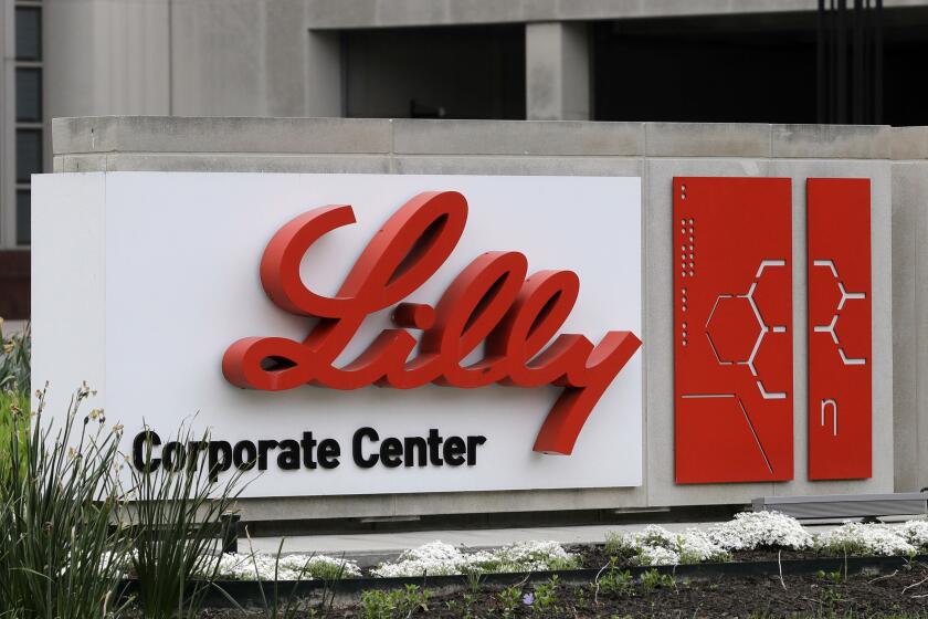 FILE - A sign for Eli Lilly & Co. sits outside their corporate headquarters in Indianapolis on April 26, 2017. Rapidly climbing sales of the new obesity drug Zepbound and its counterpart for diabetes, Mounjaro, pushed Eli Lilly to a better-than-expected first quarter profit, Tuesday, April 30, 2024. (AP Photo/Darron Cummings, File)