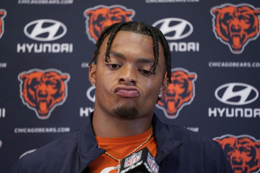 Chicago Bears quarterback Justin Fields speaks during a news conference following an NFL football game against the Kansas City Chiefs Sunday, Sept. 24, 2023, in Kansas City, Mo. The Chiefs won 41-10. (AP Photo/Ed Zurga)