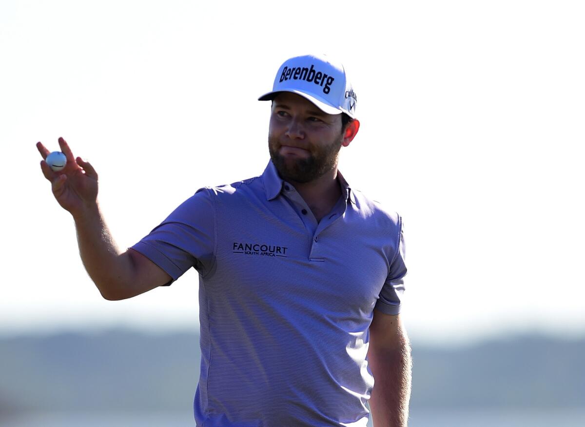 Branden Grace reacts after making a putt on the 18th hole at the RBC Heritage in Hilton Head Island, S.C. on April 17.
