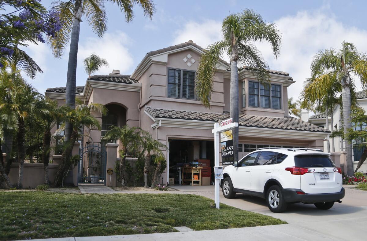 A home for sale in Carlsbad in May. On Wednesday, Freddie Mac reported that long-term U.S. mortgage rates continued to surge in the aftermath of the election.