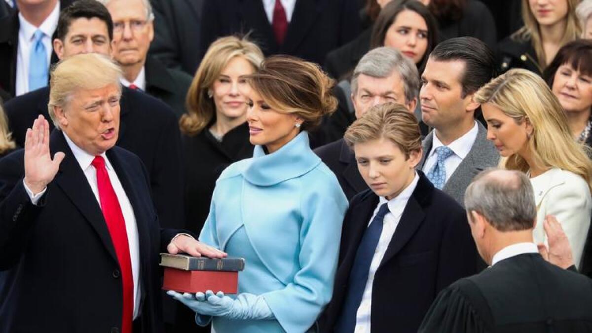Donald Trump is sworn in as the 45th president of the United States by Chief Justice John Roberts on Friday at the Capitol.
