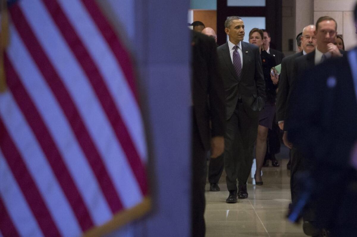 President Obama arrives for a meeting on Capitol Hill.