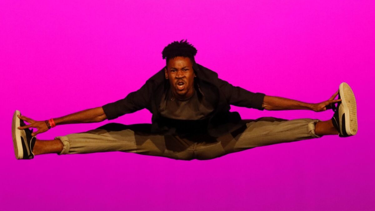 Gbari Gilliam, one of the founders of Versa-Style Dance Company, performs during the group's recent Hip Hop Dance Festival, an annual event at the East Los Angeles Performing Arts Magnet school.
