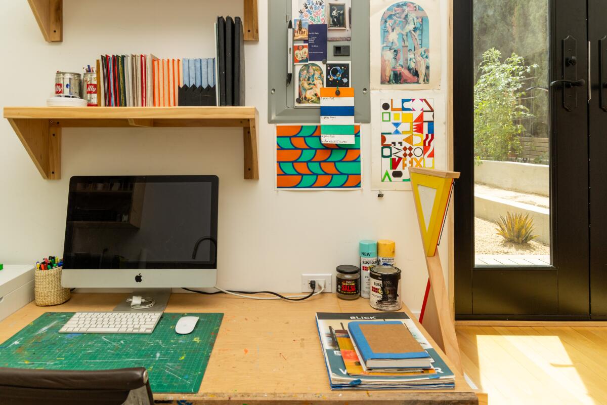 The ADU, which is attached to the garage, and just six inches from the main house, features a kitchen, bathroom and living area. Puleo is using it as part of his art studio.