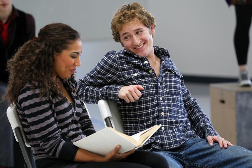 Kathleen Calvin (left) and Chris Murphy rehearse the play "A Day in the Life." The production is a part of the annual Festival of Plays by Young Writers, which kicks off Feb. 1 at Lyceum Theatre.