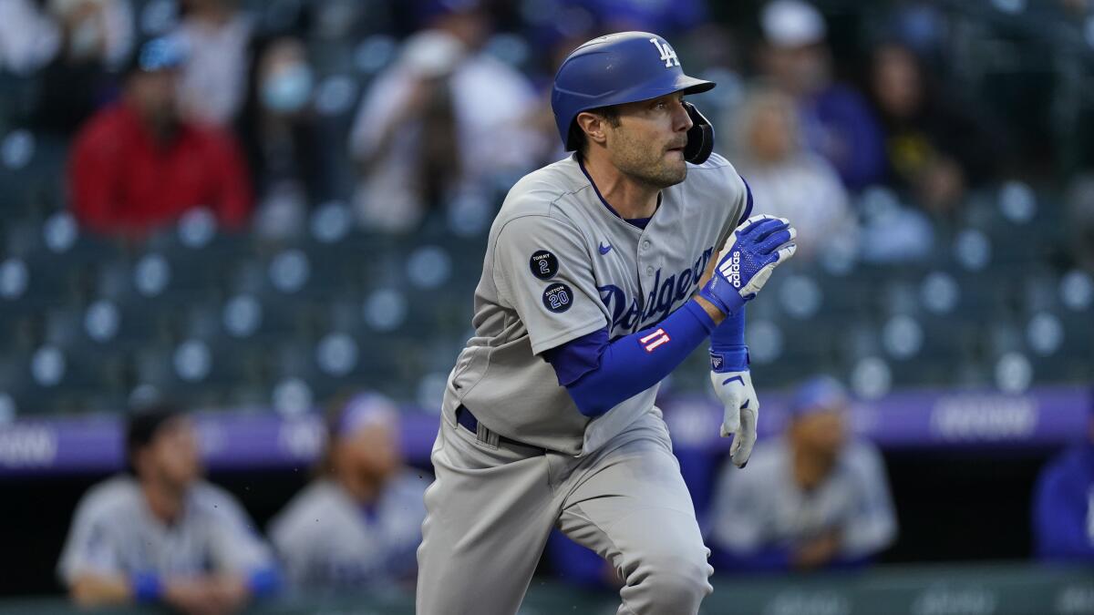 Dodgers left fielder A.J. Pollock hits against the Colorado Rockies on April 2.