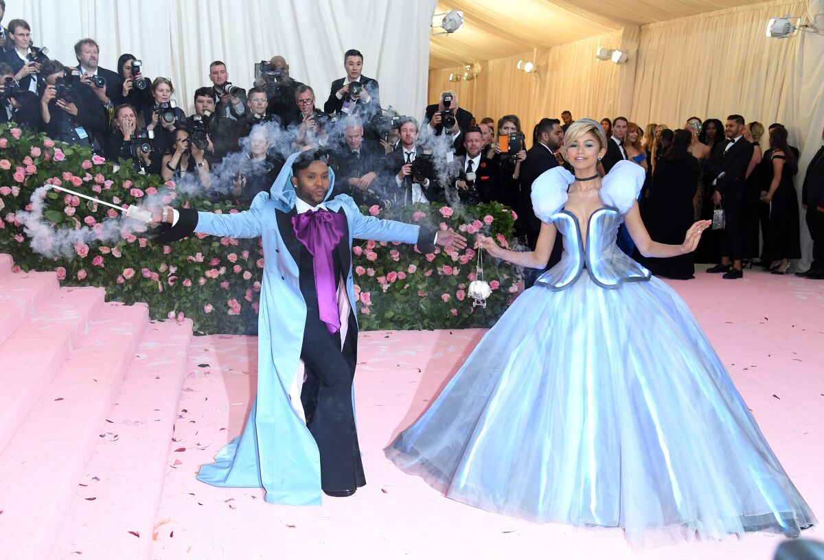Stylist Law Roach and his client Zendaya, dressed as Cinderella in a Tommy Hilfiger gown, attend the 2019 Met Gala