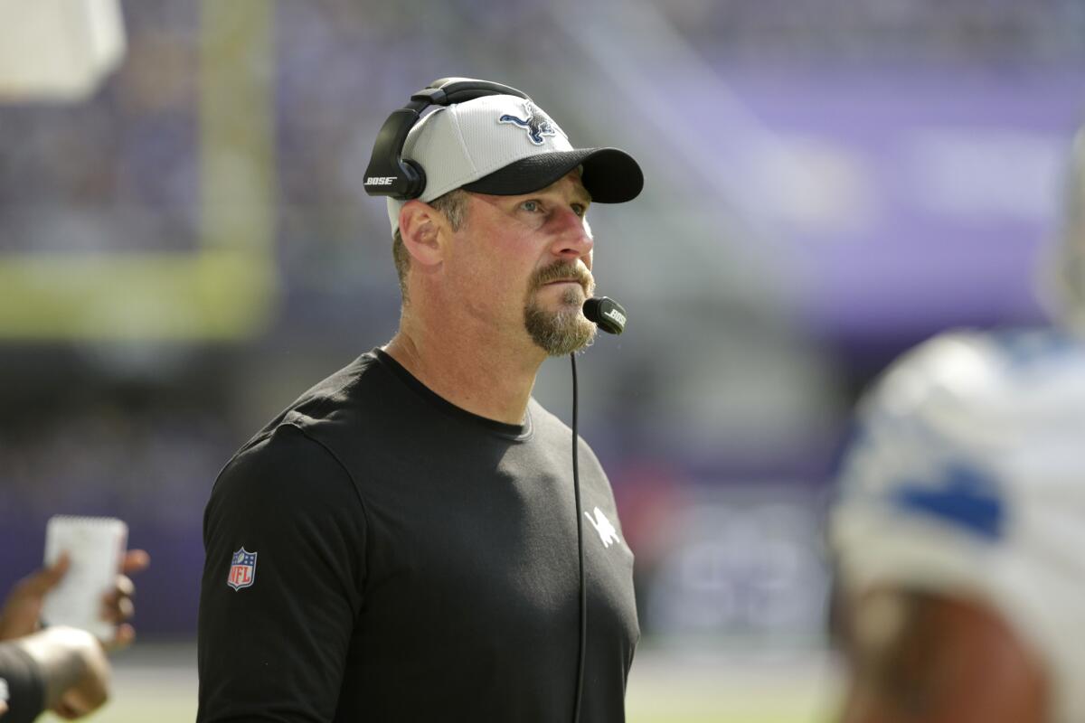 Detroit Lions head coach Dan Campbell watches from the sideline during the first half of an NFL football game against the Minnesota Vikings, Sunday, Oct. 10, 2021, in Minneapolis. (AP Photo/Andy Clayton-King)
