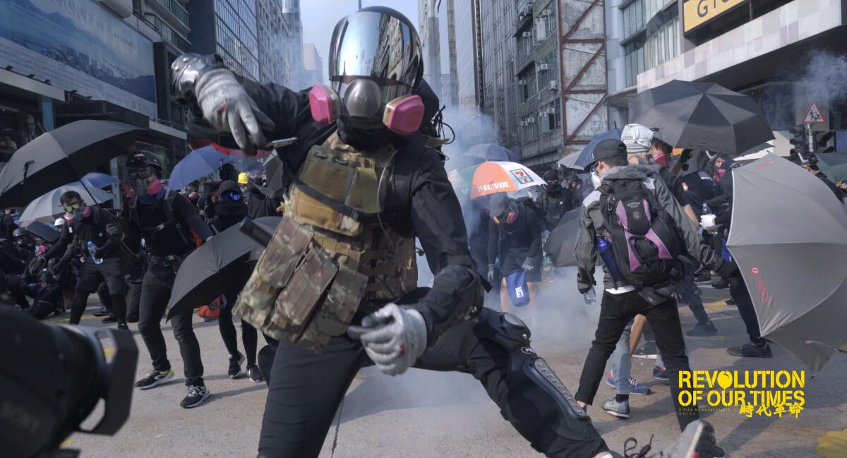 A film still from "Revolution of Our Times" shows protesters in the streets in Hong Kong.