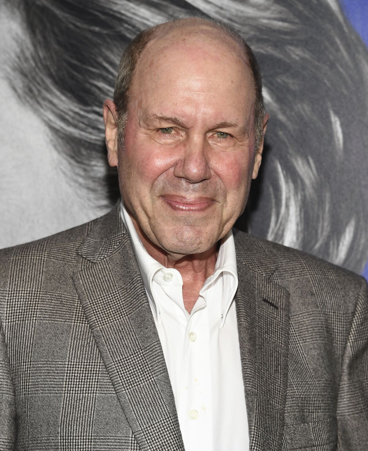 Michael Eisner in a gray suit