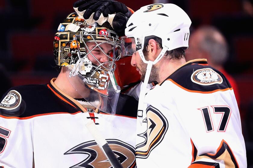 Ducks John Gibson and Ryan Kesler celebrate after a shutout win over the Chicago Blackhawks on Oct. 28.
