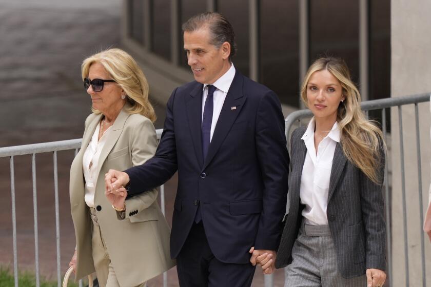 Hunter Biden, President Joe Biden's son, accompanied by his mother, first lady Jill Biden and his wife, Melissa Cohen Biden, walks out of federal court after hearing the verdict, Tuesday, June 11, 2024, in Wilmington, Del. Hunter Biden has been convicted of all 3 felony charges in the federal gun trial. (AP Photo/Matt Slocum)