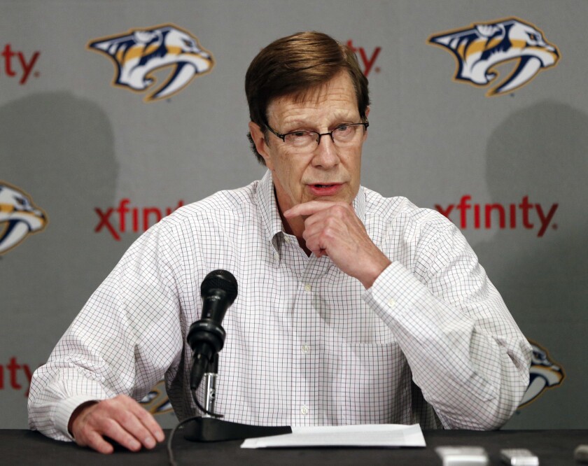 Predators General Manager David Poile answers questions at a news conference in Nashville on Apr. 14, 2014.