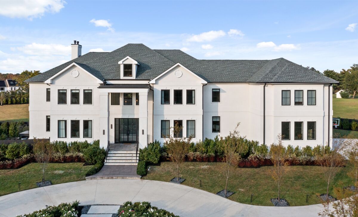 The 10,500-square-foot home comes with a movie theater, a candy room, an aquarium and a gaming room.