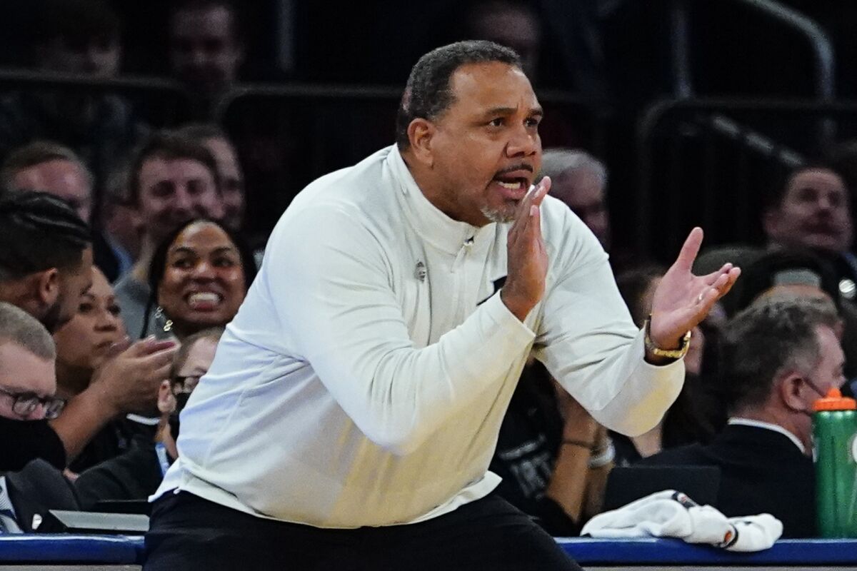 Providence head coach Ed Cooley claps for his players during the first half of an NCAA college basketball game against Butler at the Big East basketball tournament Thursday, March 10, 2022, in New York. (AP Photo/Frank Franklin II)