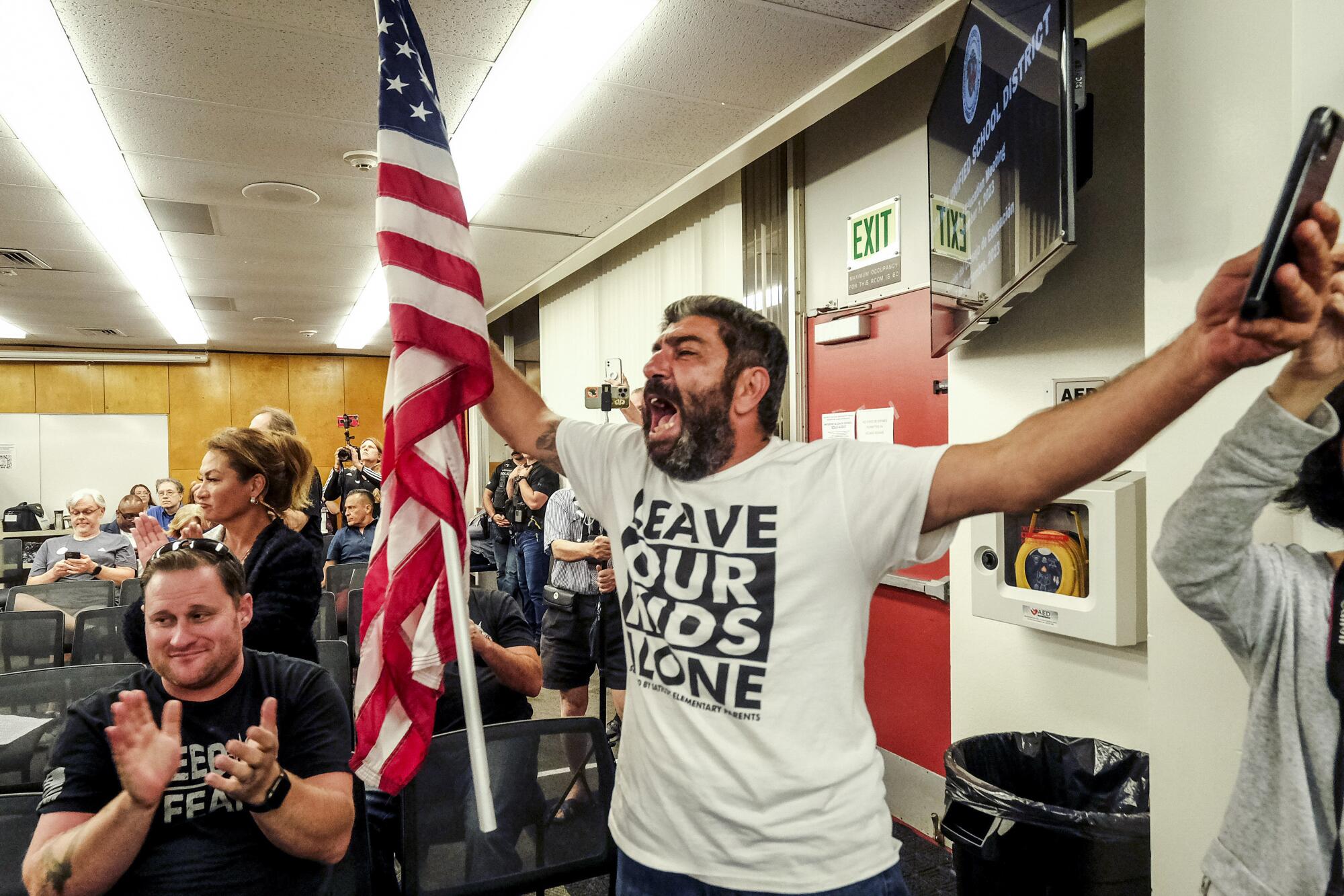 Manuk Grigoryan reacts after the Orange Unified School District board meeting on Sept. 7 in Orange.