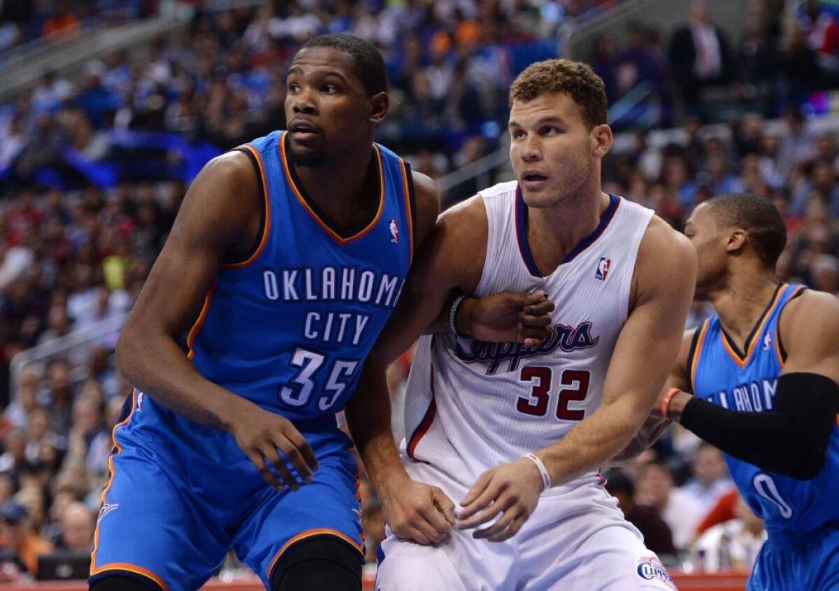 Blake Griffin of the Clippers and Kevin Durant of the Thunder compete during Wednesday's game.