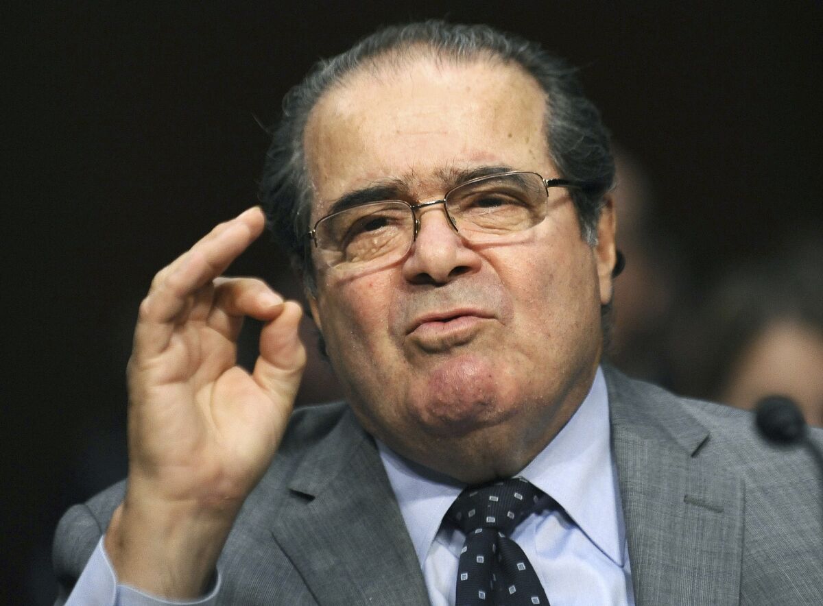 Is Supreme Court Justice Antonin Scalia riding to the rescue of public employee unions?