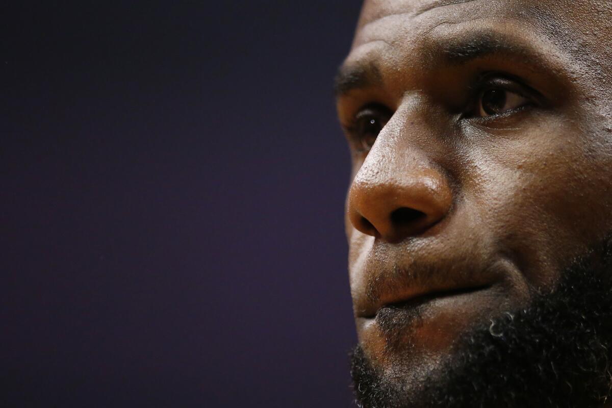 LeBron James #23 of the Los Angeles Lakers looks on during a timeout in the first half of the game against the Los Angeles Clippers at Staples Center on April 05, 2019 in Los Angeles, California.