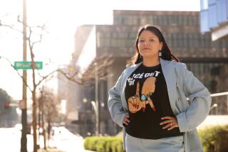 LOS ANGELES, CA, FEBRUARY 25, 2026: Ashleigh Brown, one of three defendants in a federal doxing case, is photographed at the U.S. Courthouse in downtown Los Angeles on Wednesday, February 25, 2026. (Christina House / Los Angeles Times)
