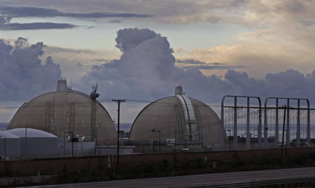 The twin domes of the San Onofre nuclear plant sit on the coast south of San Clemente. The plant permanently closed in 2013 because of design flaws with replacement steam generators.