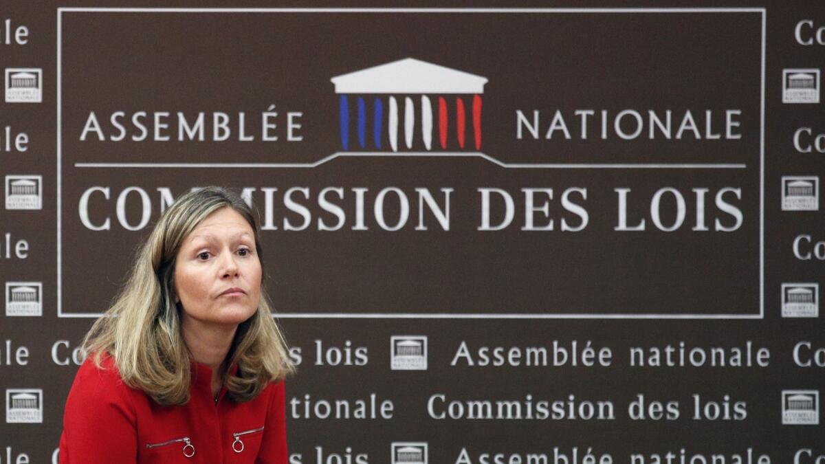 President of the Laws Commission Yael Braun-Pivet waits for the arrival of French Interior Minister Gerard Collomb for a hearing about presidential security aide Alexandre Benalla at the National Assembly in Paris on July 23, 2018.