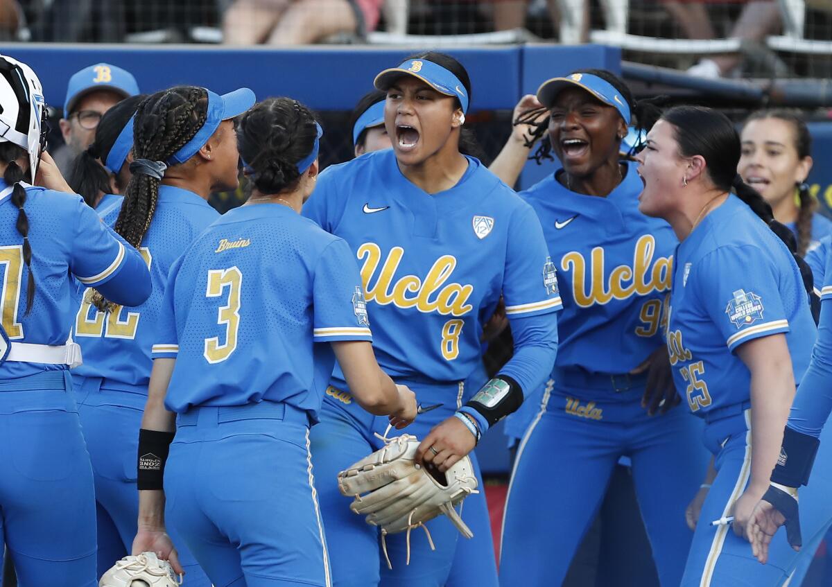 UCLA pitcher Megan Faraimo (8) is fired up after she got out of a fifth-inning, bases-loaded jam June 3, 2022.