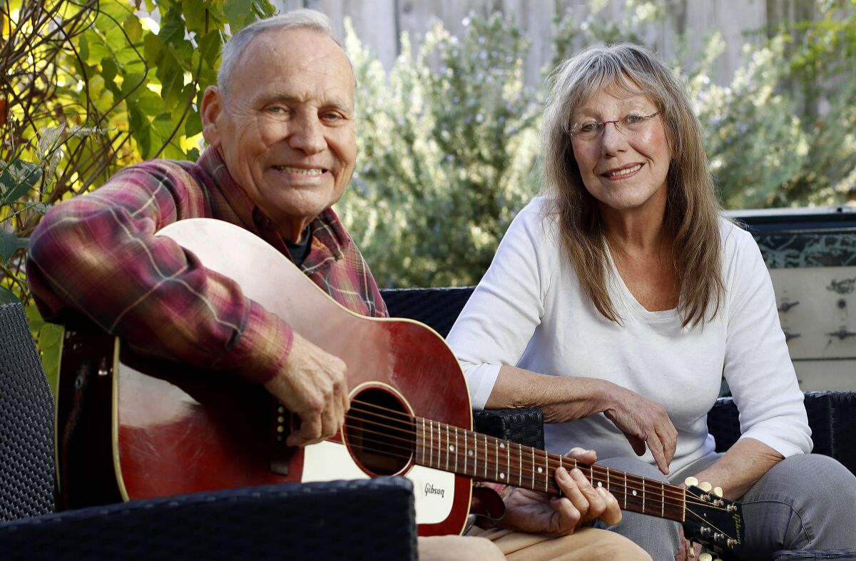 San Diego Troubadour co-founders and publishers and Kent Johnson, left, and Liz Abbott at their home in University Heights. 