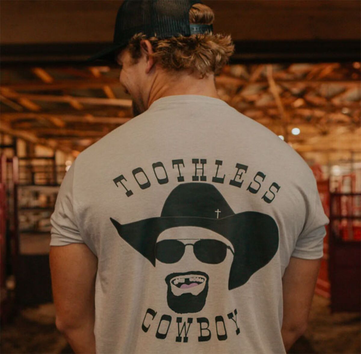 Caden McDonald models one of the more popular shirts from his Toothless Cowboy collection.