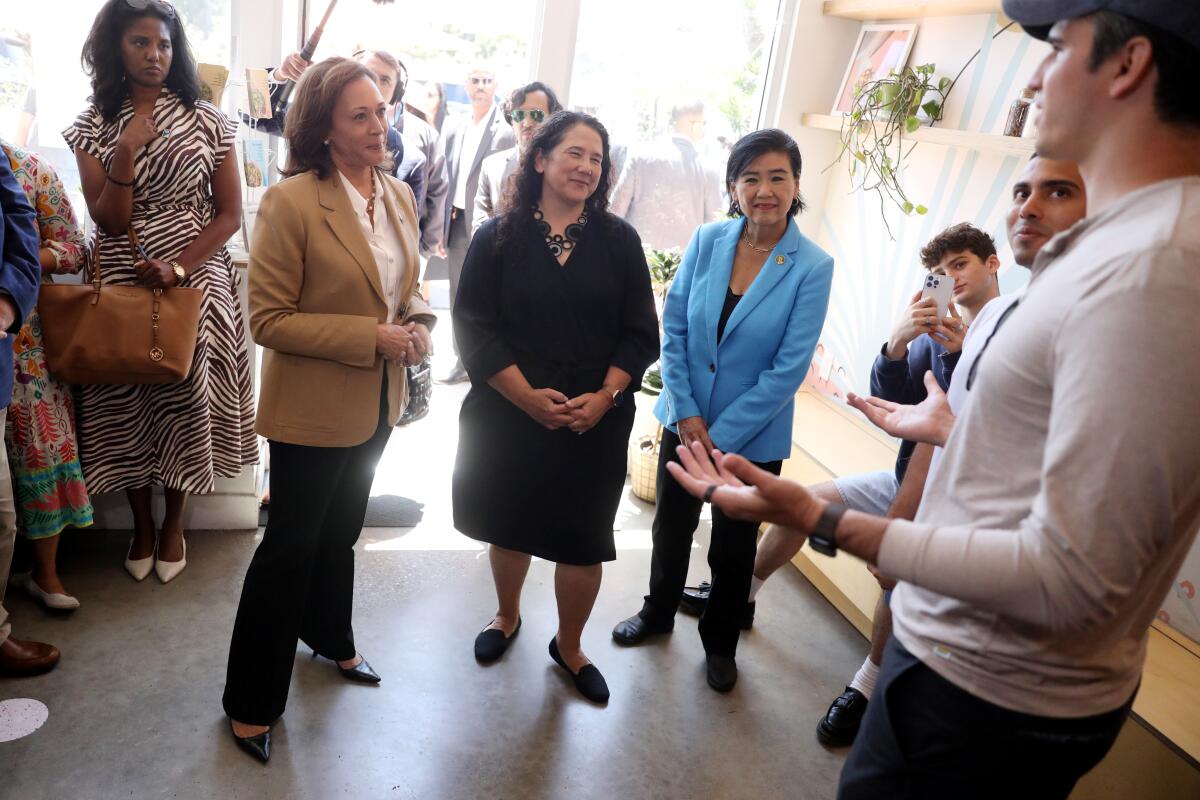 SANTA MONICA, CA - JULY 05: Vice President Kamala Harris, second from left, Isabella Casillas Guzman, Administrator of the Small Business Administration (SBA), and Rep. Judy Chu (D-Monterey Park) visit with co-founders Andrew Arrospide, and Dan Londono, far right, at Alfalfa restaurant along Main St. on Wednesday, July 5, 2023 in Santa Monica, CA. (Gary Coronado / Los Angeles Times)