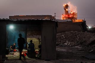 WADI AL-NAAM, ISRAEL -- OCTOBER 23, 2023: Residents of an unrecognized village, Wadi Al Naam, live unconnected to the power grid even though they are in the close proximity of Ramat Hovav power plant, in Wadi Al-Naam, Israel, Monday, Oct. 23, 2023. At least 20 Bedouin citizens of Israel were killed Oct. 7 N seven by HamasO rockets and the rest when the groupOs fighters blitzed into farms near Gaza, apparently paying little heed to whom they were killing. Seven others Bedouins were kidnapped, with still no word on their fate. The Bedouins have long eked out a life on the margins of Israeli society, living in unrecognized settlements D dotting the expanse of the Negev. They suffer a level of dispossession and official harassment that makes them feel more vulnerable and second-class than other Palestinian citizens of Israel, according to residents. Due to the perennial threat of rockets from the Gaza Strip, all structures in Israel, including homes, are required to have shelters, but the Bedouins settlements not allowed any new construction because of their unrecognized status. Since then, charities and various companies have donated makeshift shelters that offer little protection, according to residents. Now, the war has energized IsraelOs far right, and anti-Palestinian and anti-Arab rhetoric has deepened the sense of disenfranchisement among IsraelOs 300,000 Bedouin citizens, just over 3% of the population. As they search for a secure place in a wounded nation seeking revenge, they stand on a fault line between Israel and many of Palestinians N citizens or the occupied N over which it rules. (MARCUS YAM / LOS ANGELES TIMES)