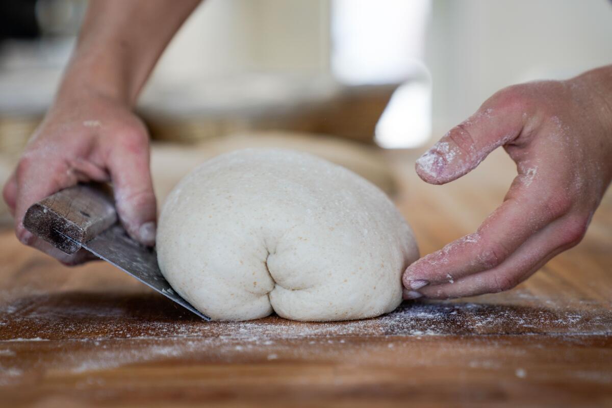 Jyan Isaac Horwitz prepares dough