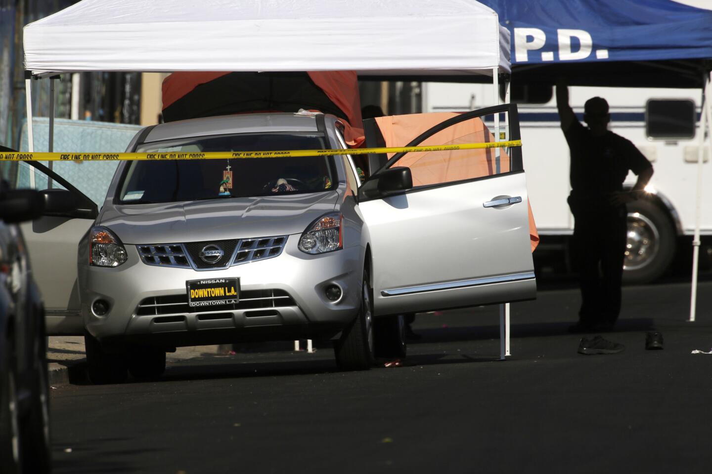 Three boys found fatally stabbed in South L.A. were brothers