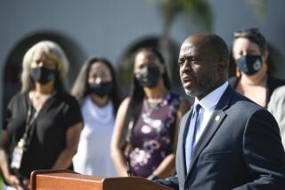 California State Superintendent of Public Instruction Tony Thurmond speaks outside of Enrique S. Camarena Elementary School on the first day of school, Wednesday, July 21, 2021, in Chula Vista, Calif. The school is among the first in the state to start the 2021-22 school year with full-day, in-person learning. (AP Photo/Denis Poroy)