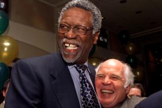 Celtic great Bill Russell is pictured with friend and author Taylor Branch, who co-wrote the book "Second Wind."
