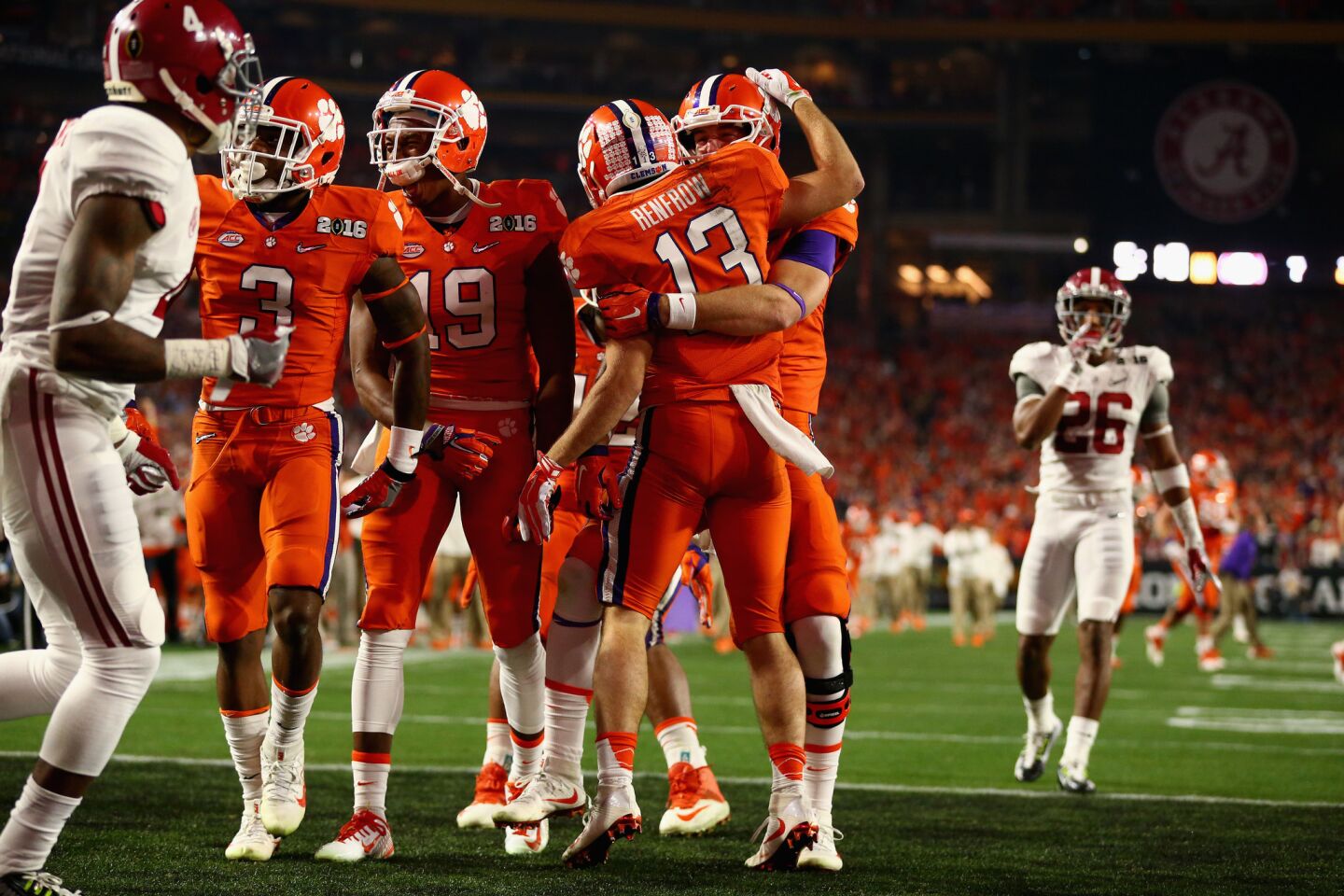 Clemson receiver Hunter Renfrow celebrates with his teammates after scoring a 31-yard touchdown from Deshaun Watson in the first quarter.