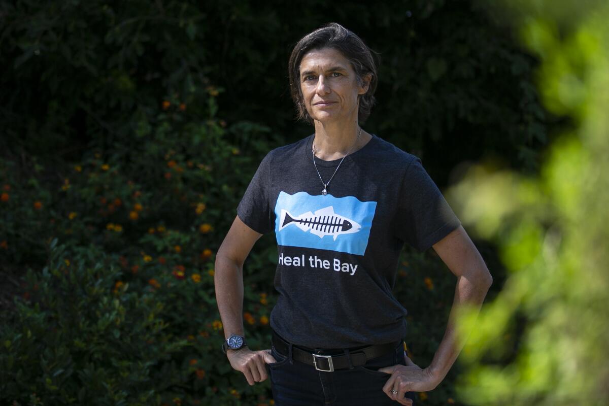 Shelley Luce wears a T-shirt with the Heal the Bay logo.