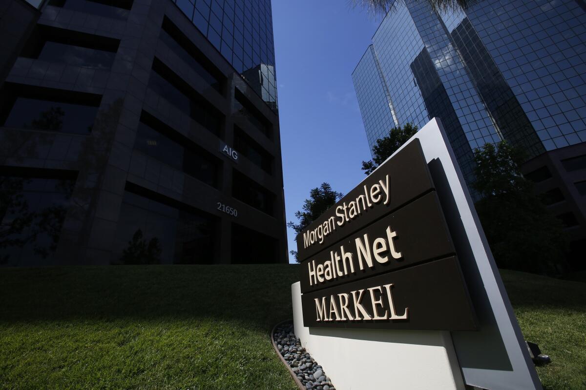 A sign for Health Net outside corporate office buildings