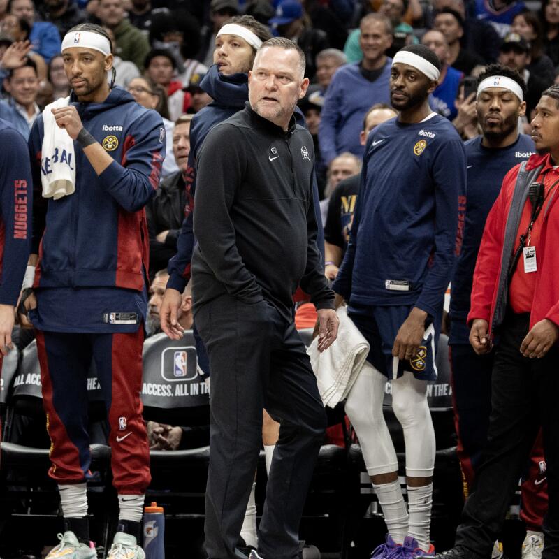 Denver coach Michael Malone leaves the court after being ejected in the fourth quarter.