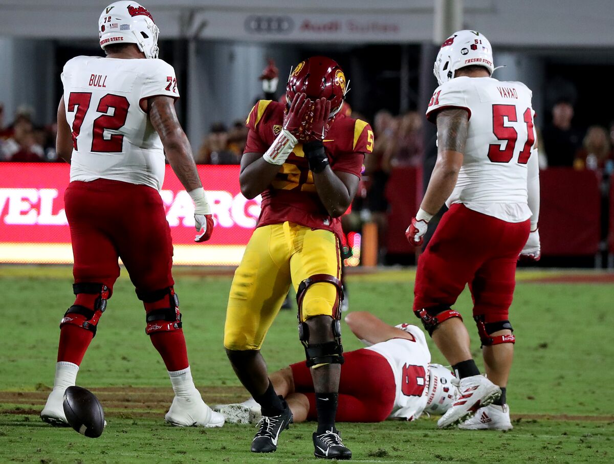 USC defensive end Solomon Byrd celebrates after recovering a fumble by Fresno State quarterback Jake Haener