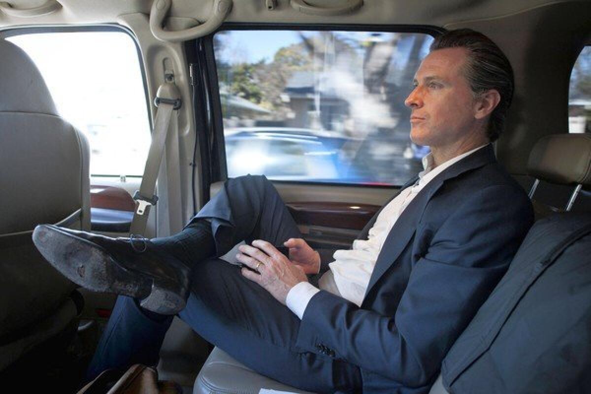Lt. Governor Gavin Newsom in his California Highway Patrol driven transport vehicle between speaking engagements in Silicon Valley on 28 Feb 2013