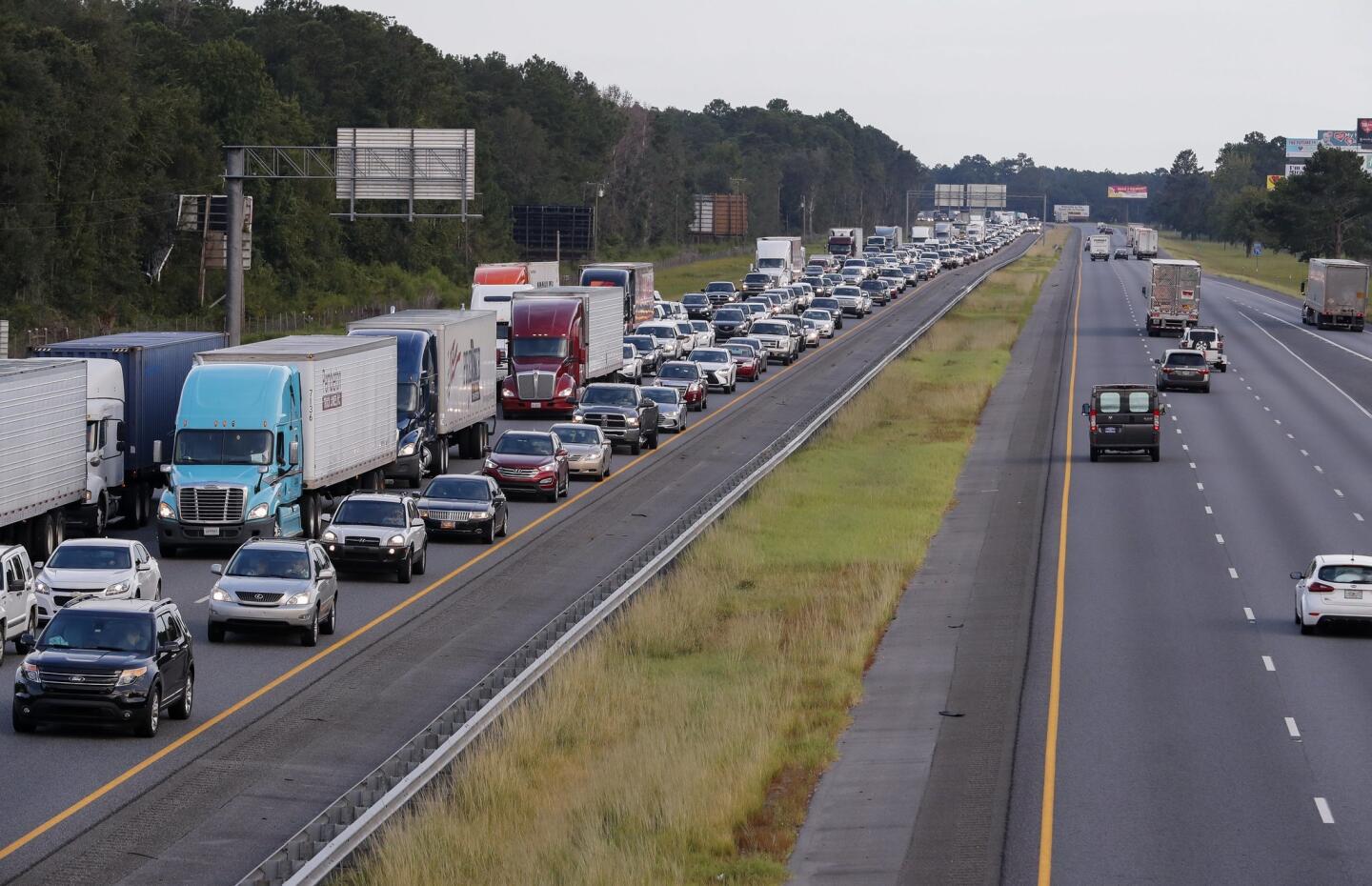 Traffic streaming out of Florida ahead of Hurricane Irma creeps along northbound Interstate 75 in Lake Park, Ga., on Sept. 6, 2017.