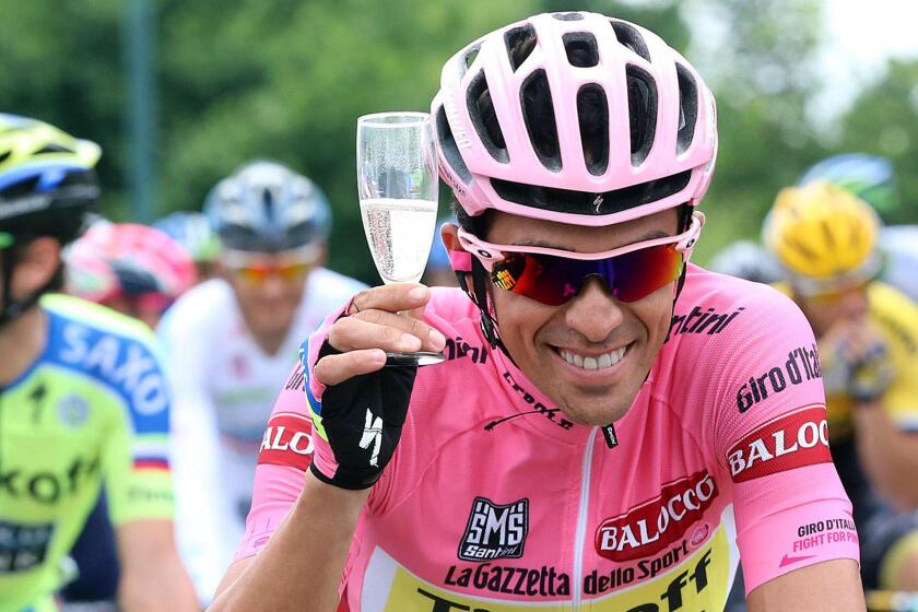 Alberto Contador celebrates his Giro d'Italia victory during the final stage of the race in Turin, Italy, on Sunday.