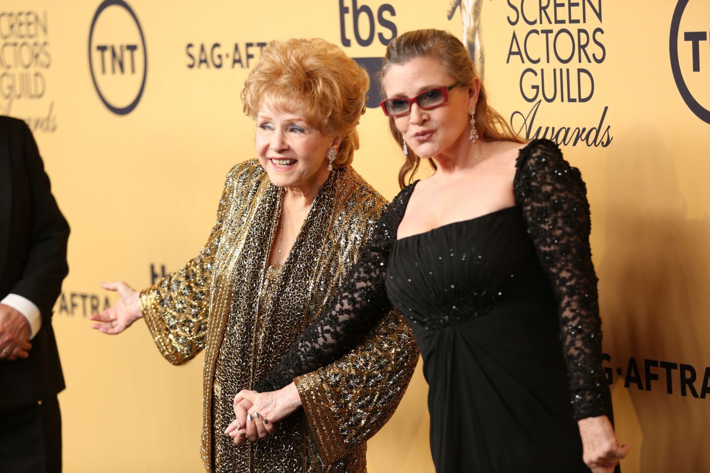 Carrie Fisher, right, with her mother, Debbie Reynolds, at the 21st Screen Actors Guild Awards in Los Angeles on Jan. 25, 2015.