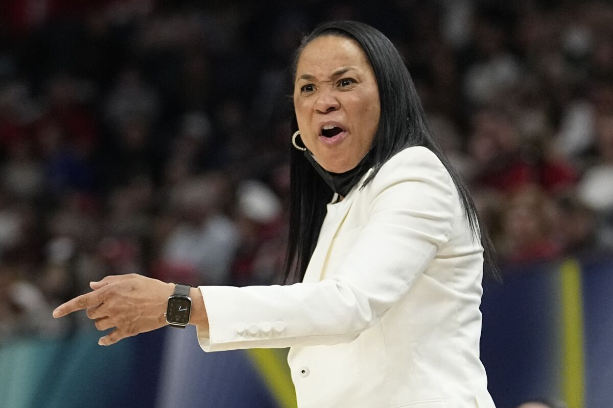 South Carolina head coach Dawn Staley reacts during the first half of a college basketball game in the semifinal round of the Women's Final Four NCAA tournament Friday, April 1, 2022, in Minneapolis. (AP Photo/Eric Gay)
