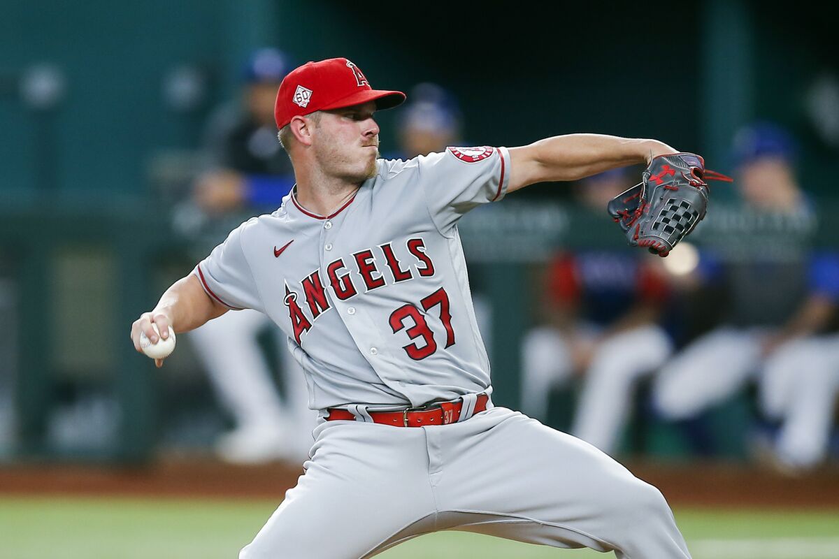 Los Angeles Angels starting pitcher Dylan Bundy (37) throws during the first inning of a baseball game against the Texas Rangers, Thursday, Aug. 5, 2021, in Arlington, Texas. (AP Photo/Brandon Wade)