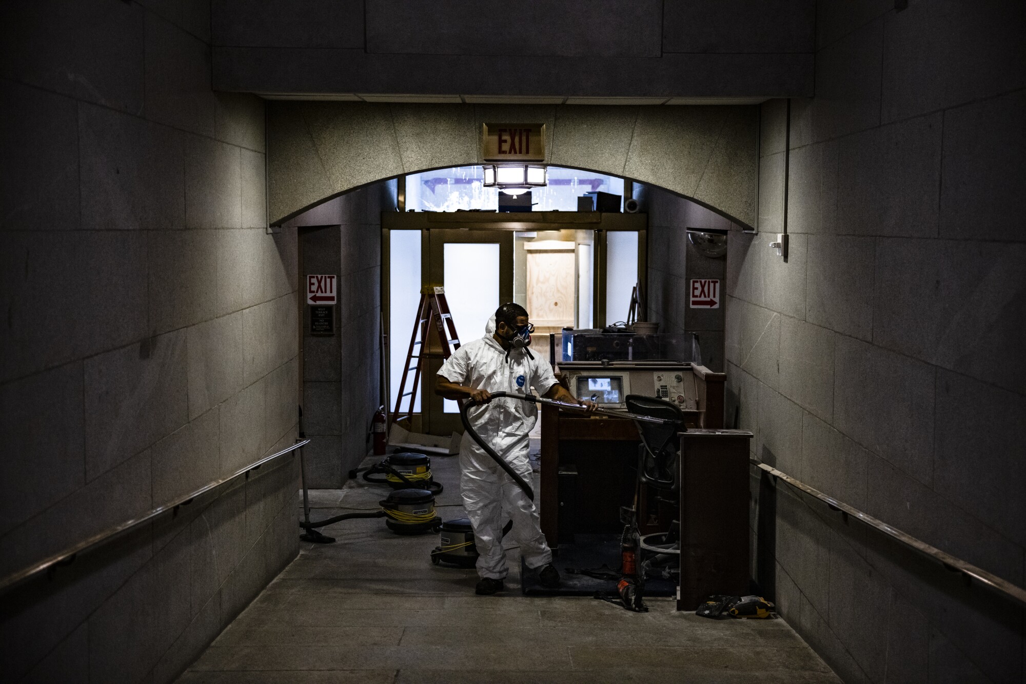Workers begin to clean up the debris and damage caused by a pro-Trump mob at the U.S. Capitol building in Washington, DC.