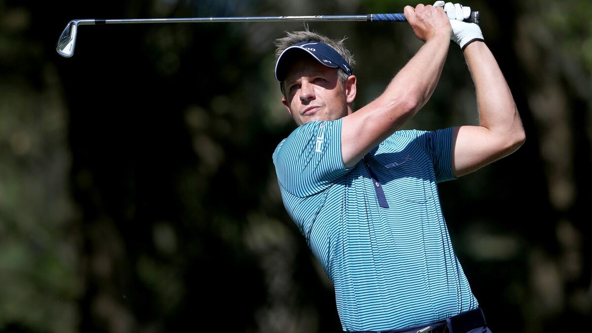 Luke Donald hits his tee shot Saturday at No. 13 during the third round of the RBC Heritage.